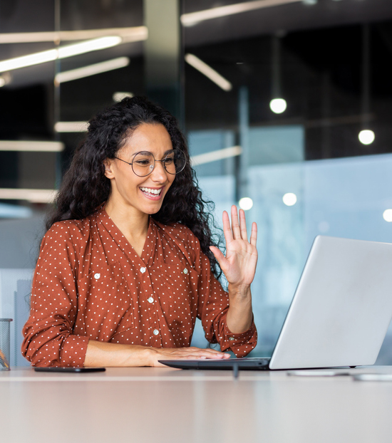 female student in front of a laptop