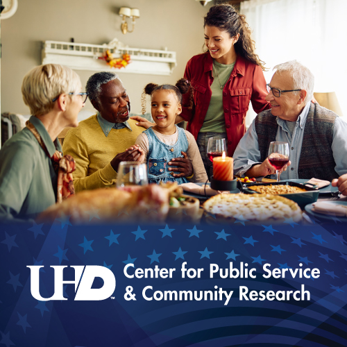 Families and Politics - elderly family and friends smiling together at the dinner table.