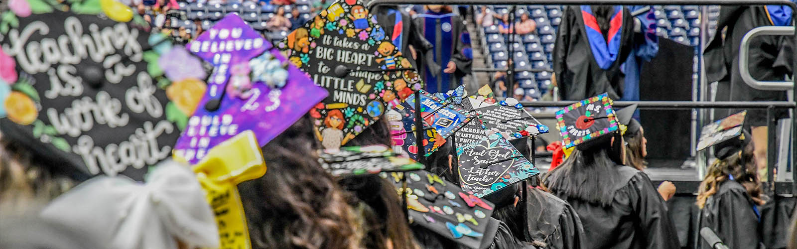 UHD Student standing in line during commencement