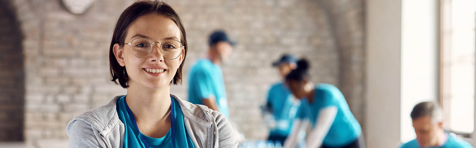 Social Worker Volunteering at Food Drive