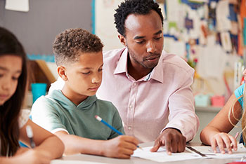 Teacher Helping a student