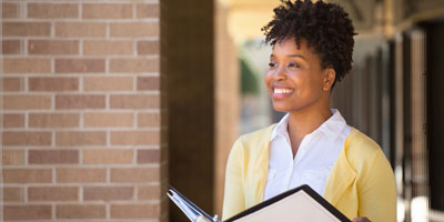 Student Affairs scholarships African American college student smiling