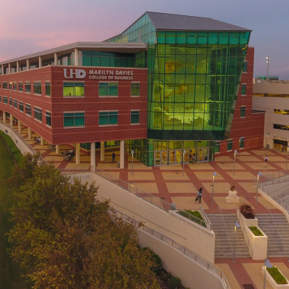 Image of the Marilyn Davies College of Business building at dusk.