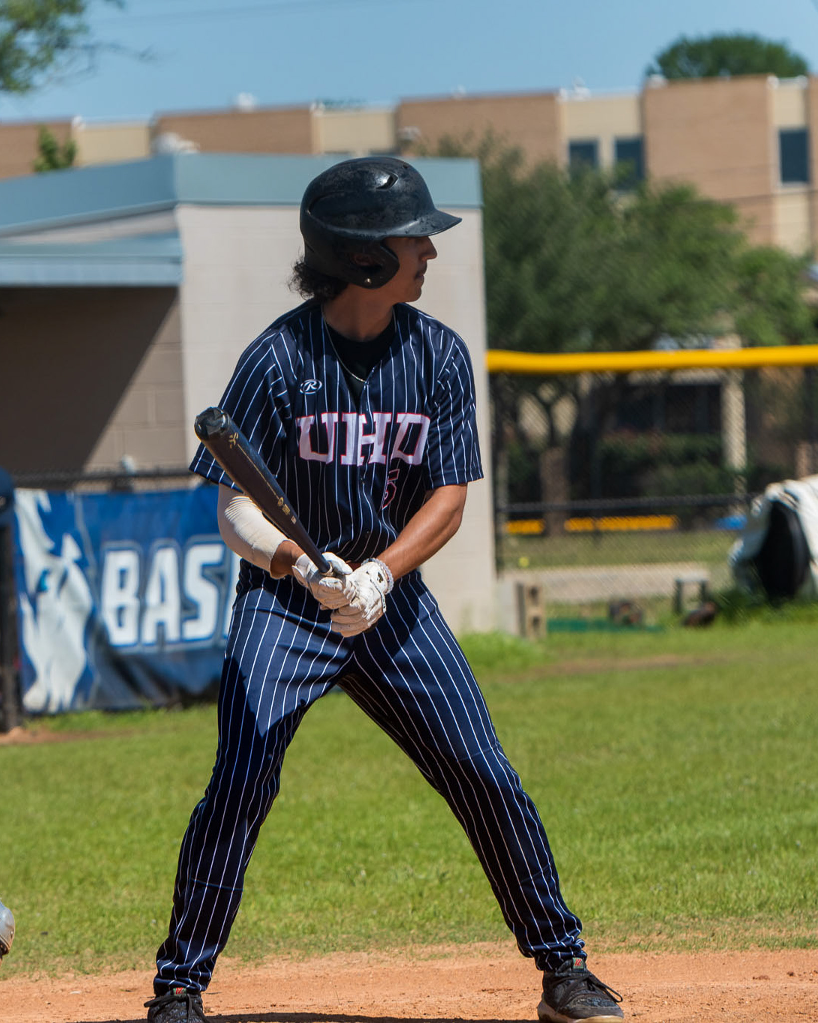 Student playing baseball