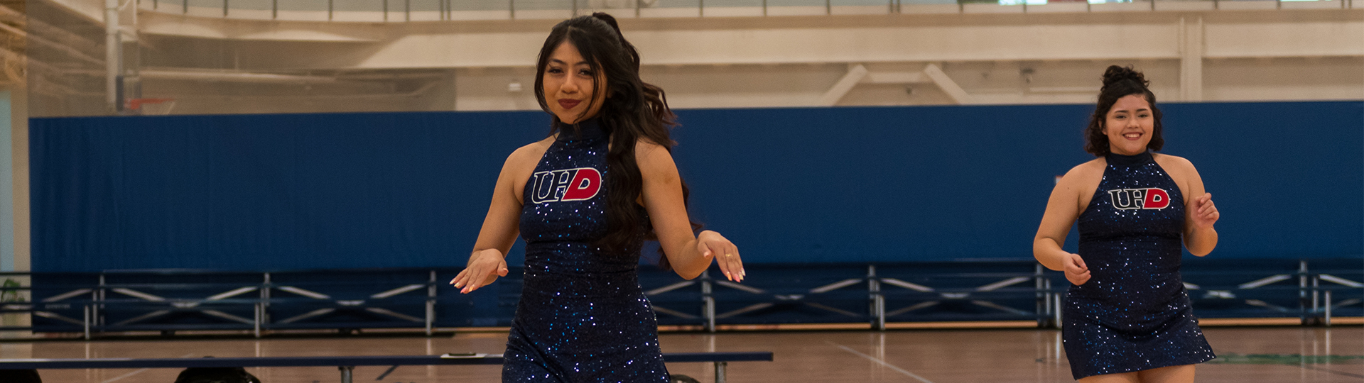 UHD cheerleaders in the gym