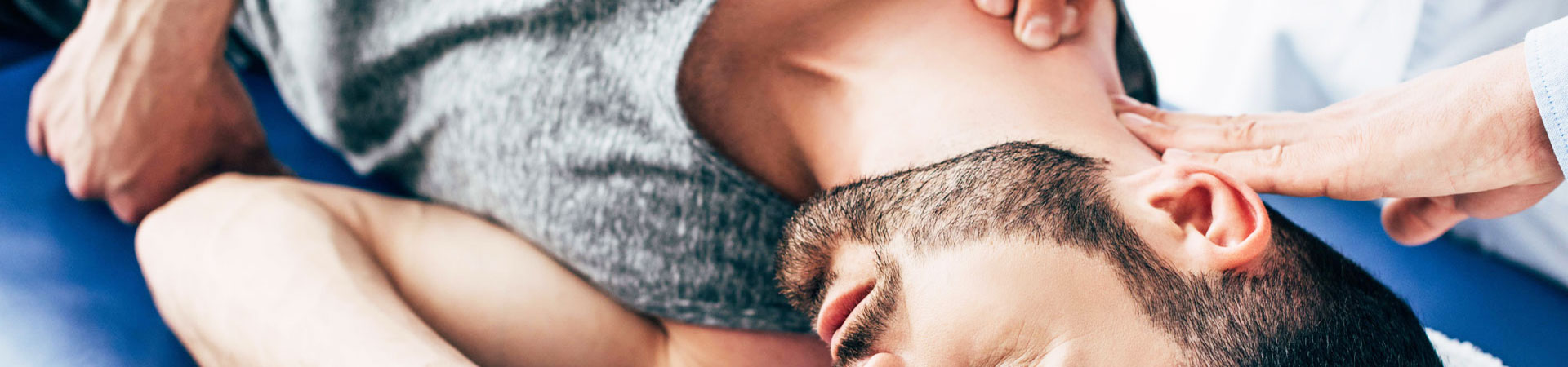 man receiving a neck massage