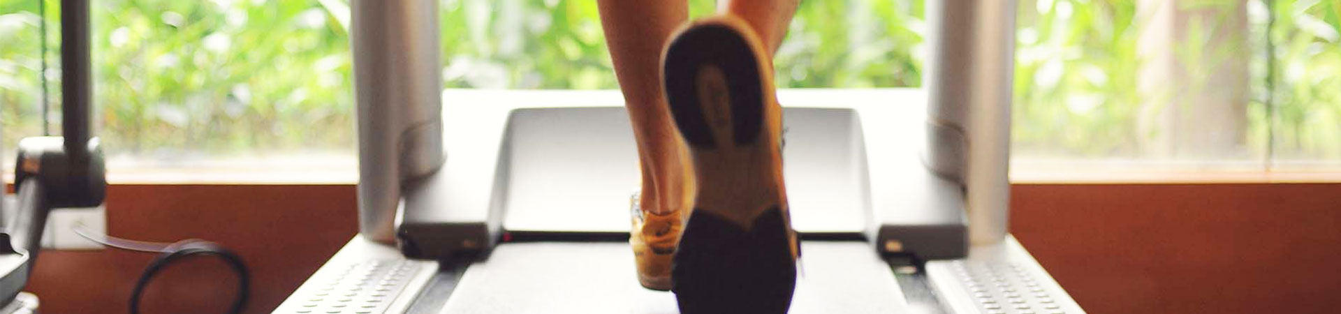 person walking on treadmill