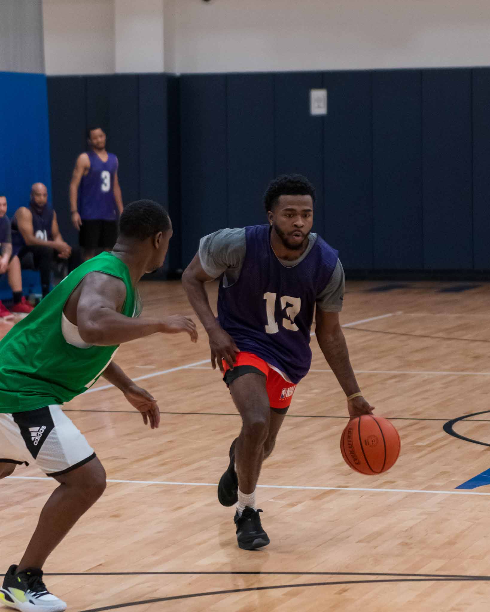 Student dribbling a basketball 