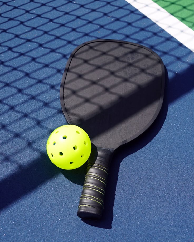 Pickleball racket and ball