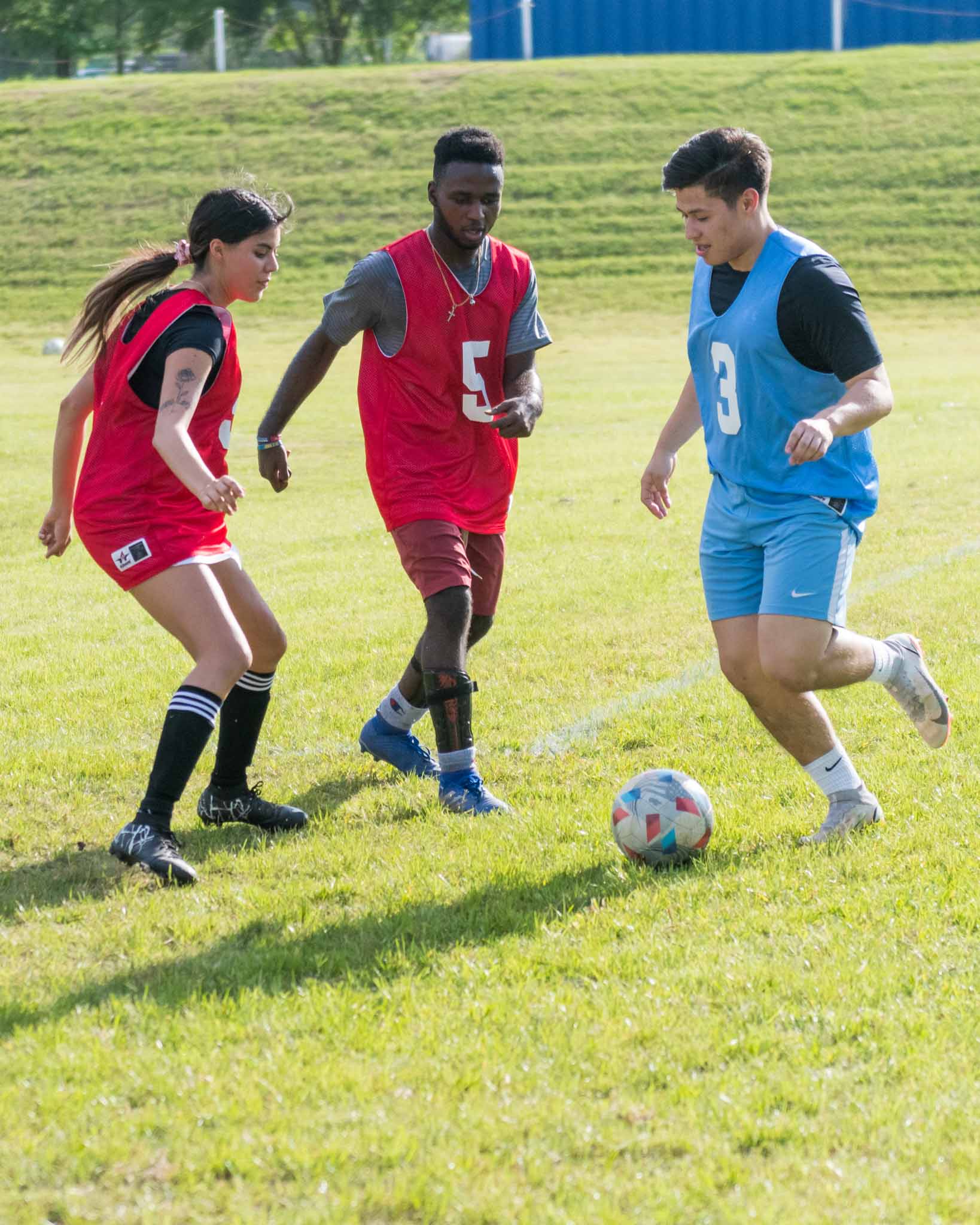 Students playing soccer