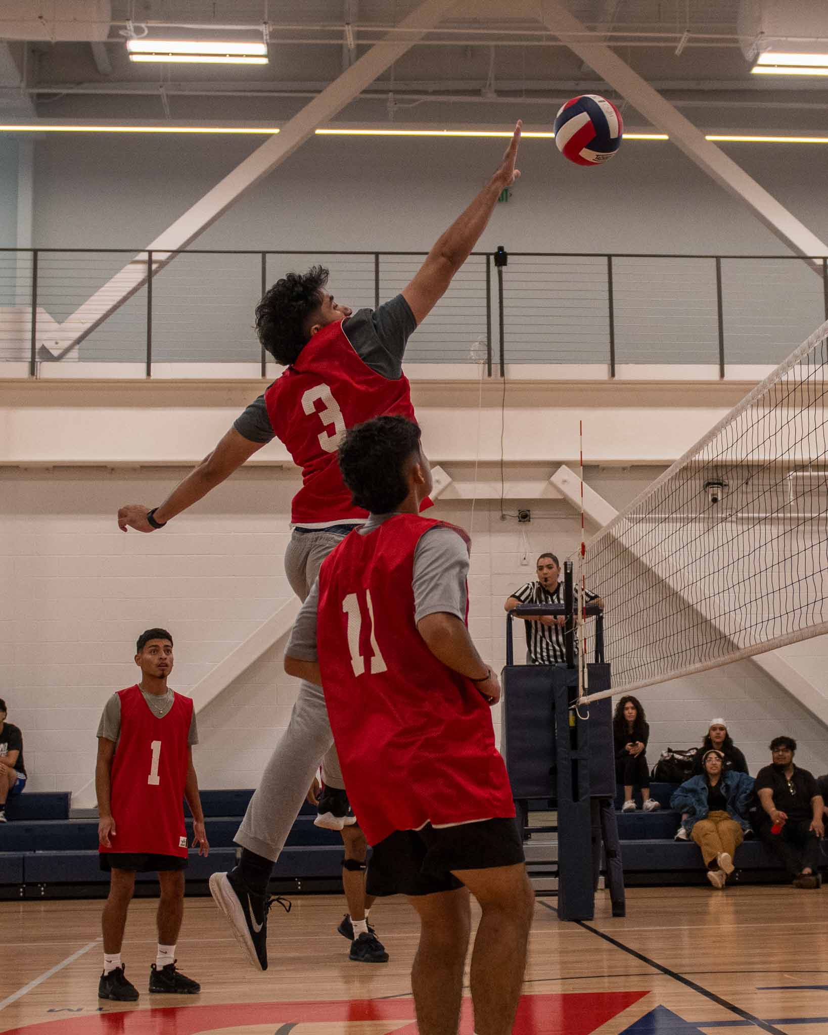 Students playing volleyball