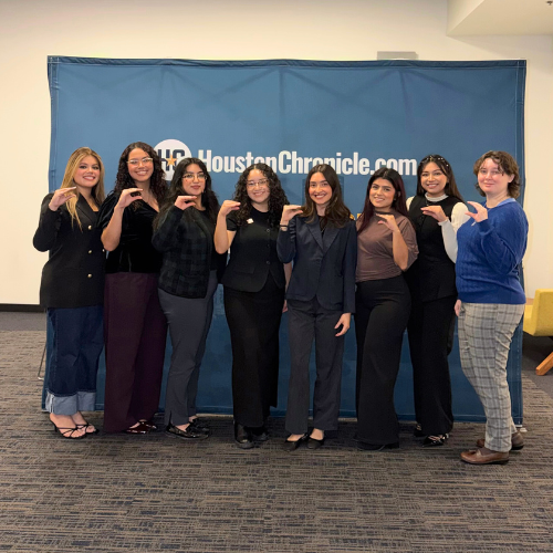 Eight university students smile at the university of houston downtown. Text reads university of houston-downtown fall open house, saturday, october 25, 2025, 10 a.m.-1 p.m. website link is uhd.edu/openhouse