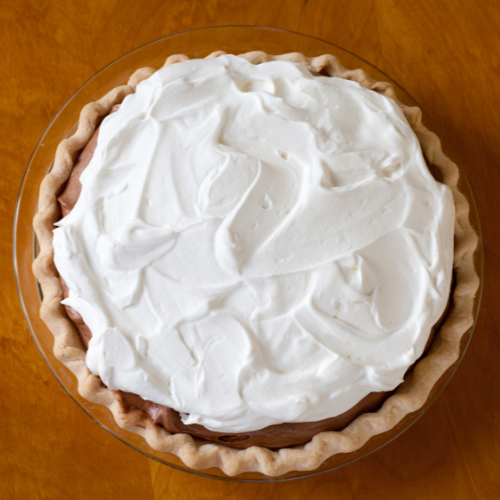 A chocolate cream pie in a pie dish