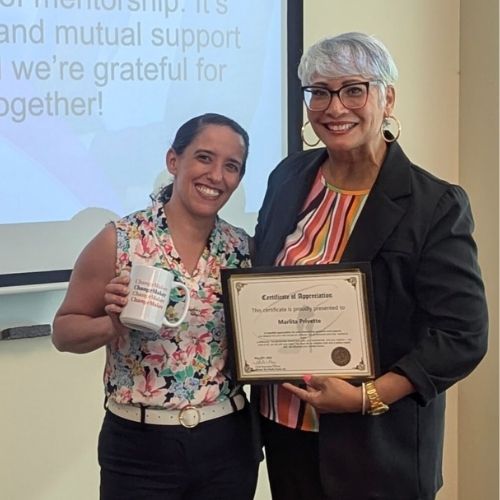 Marlita Privette stands aside Yvette Mayo founder of Power on Heels Fund