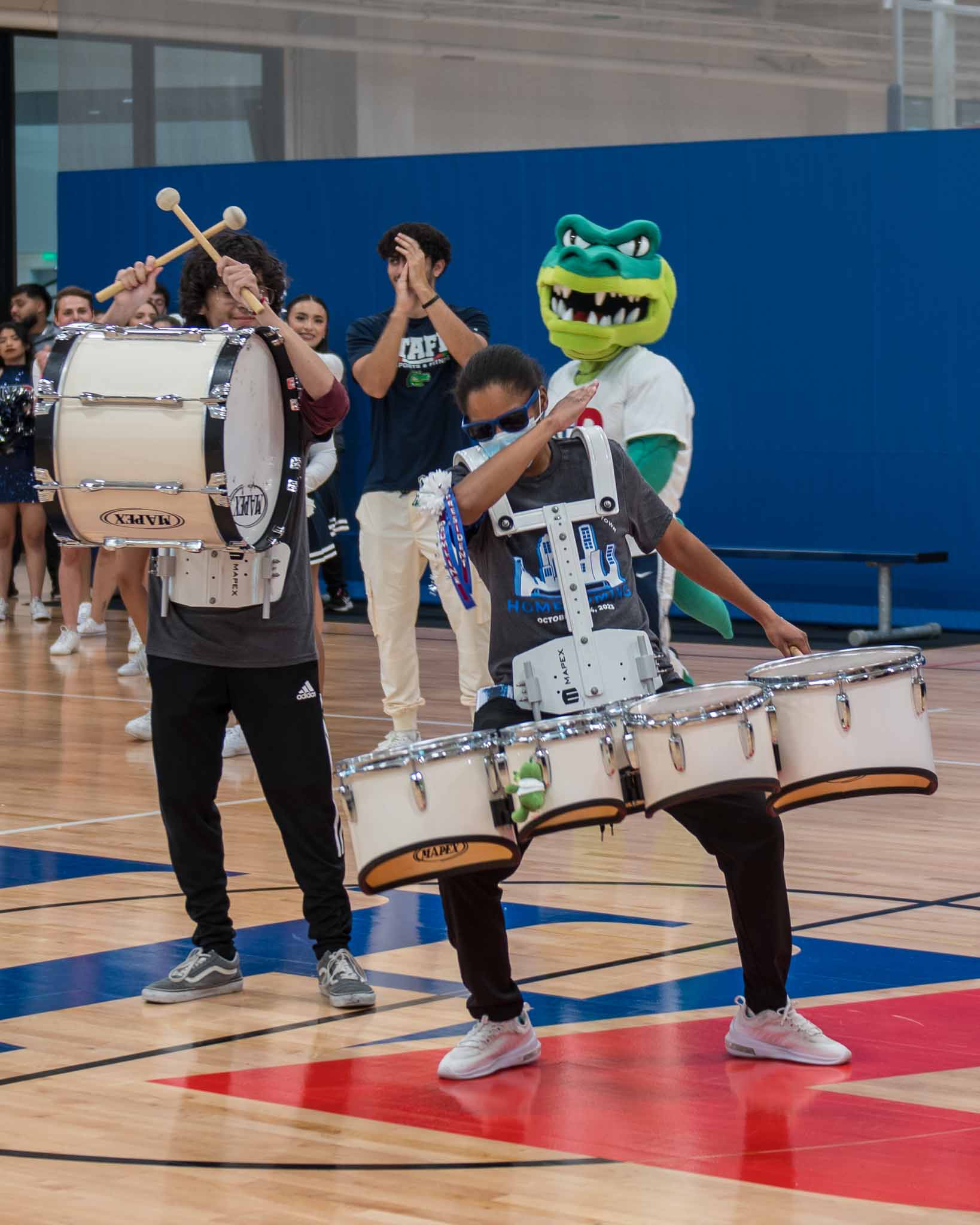 Students playing drums 
